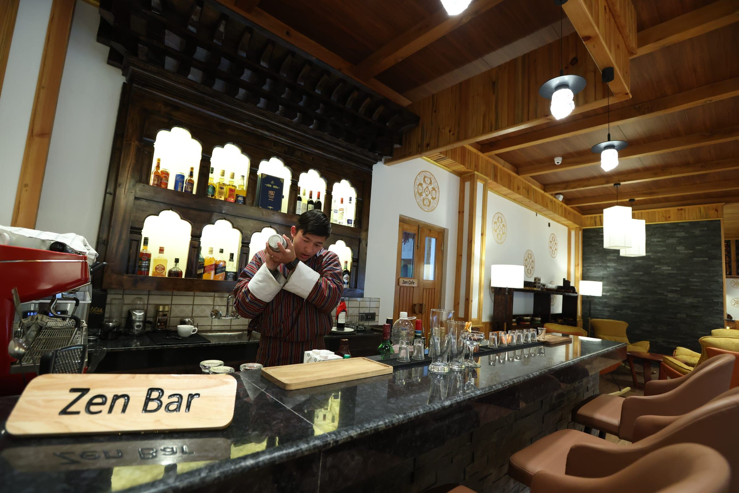 Bartender at the Zen Bar counter at Highland Glamping Paro