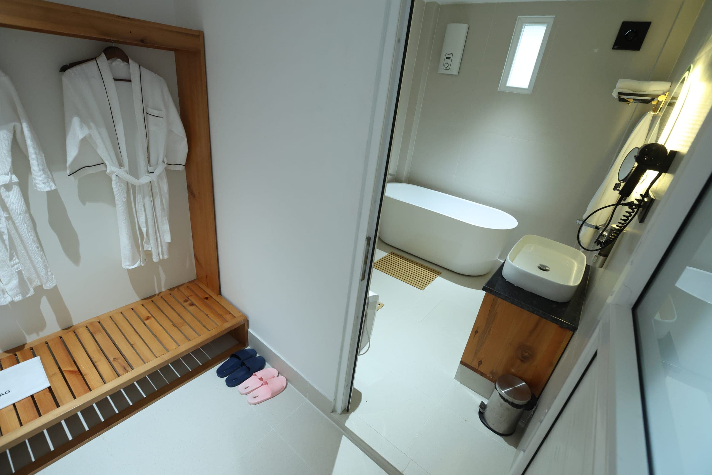 Bathrobes hanging in the Deluxe Dome dressing area
