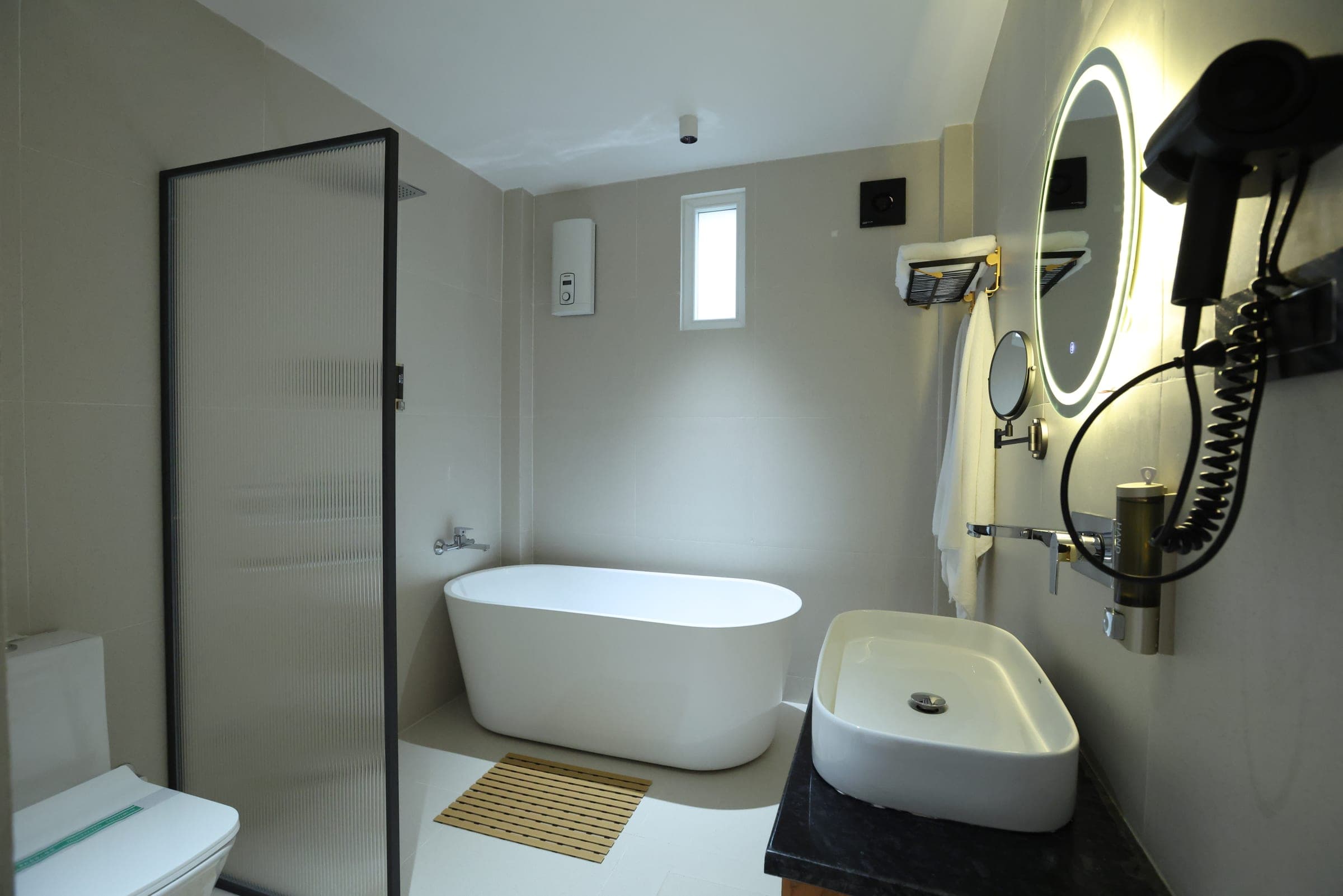 Superior Deluxe Dome bathroom with freestanding bathtub
