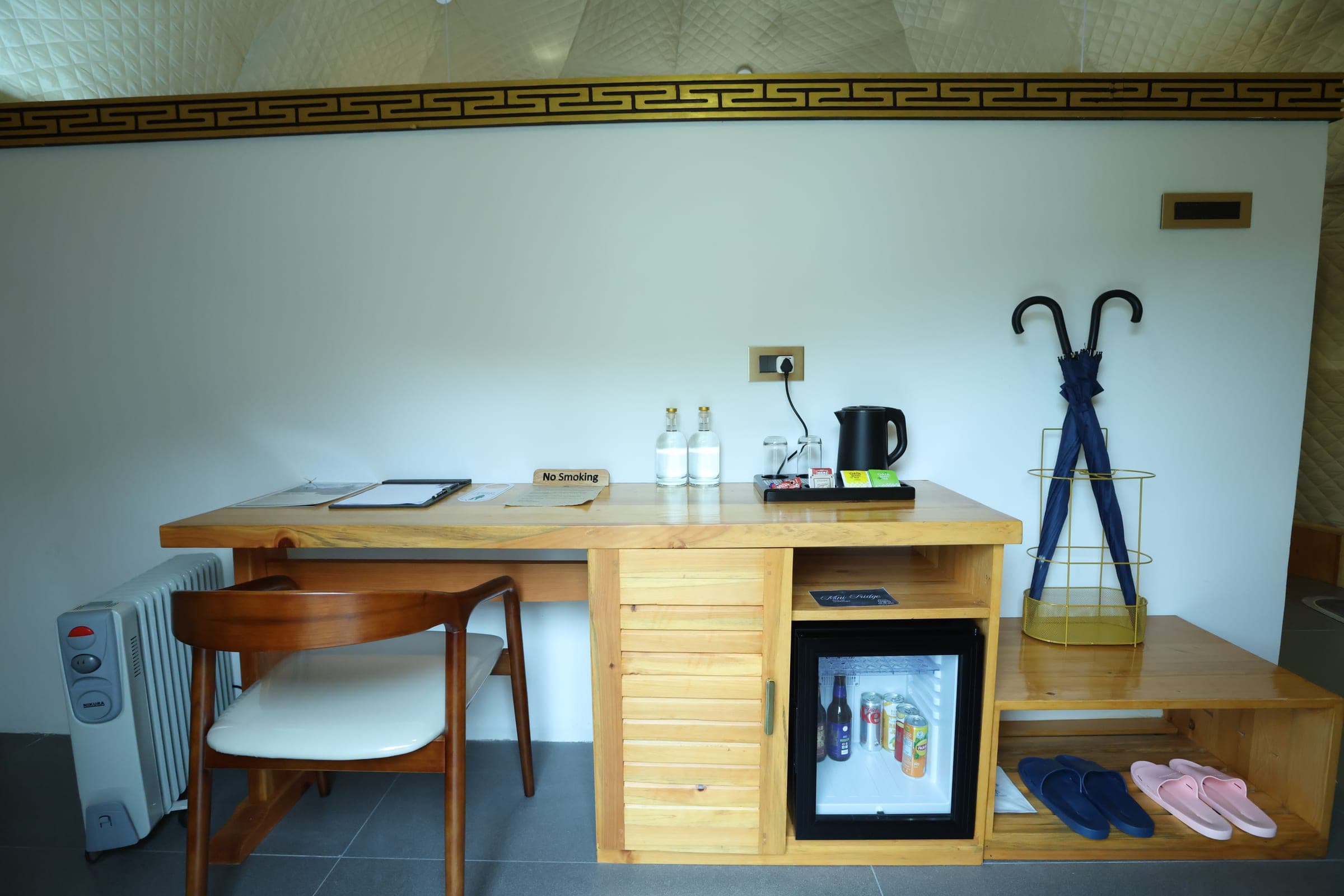 Writing desk and mini bar inside the Superior Deluxe Dome
