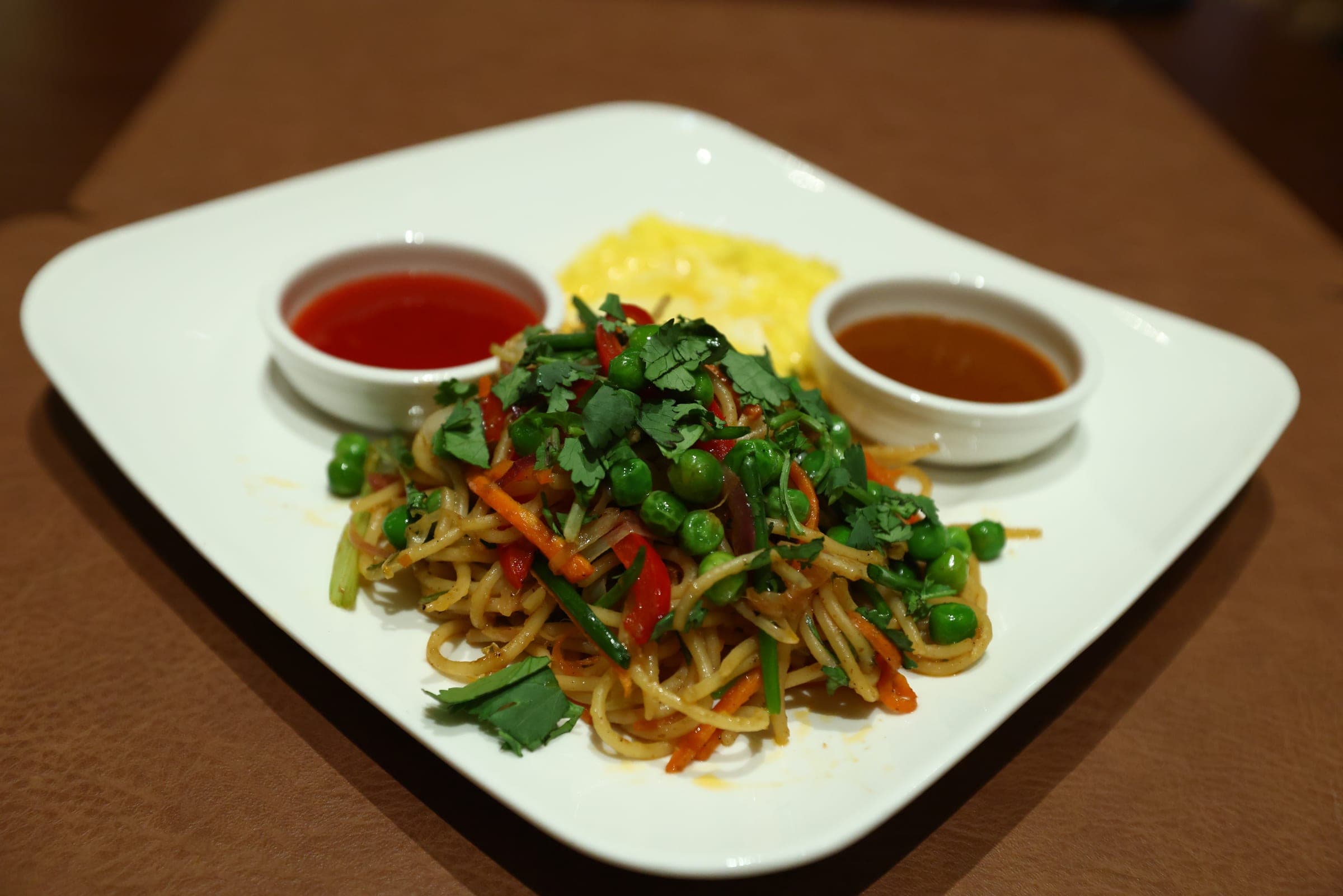 Freshly prepared Bhutanese-style chow mein served at Highland Glamping