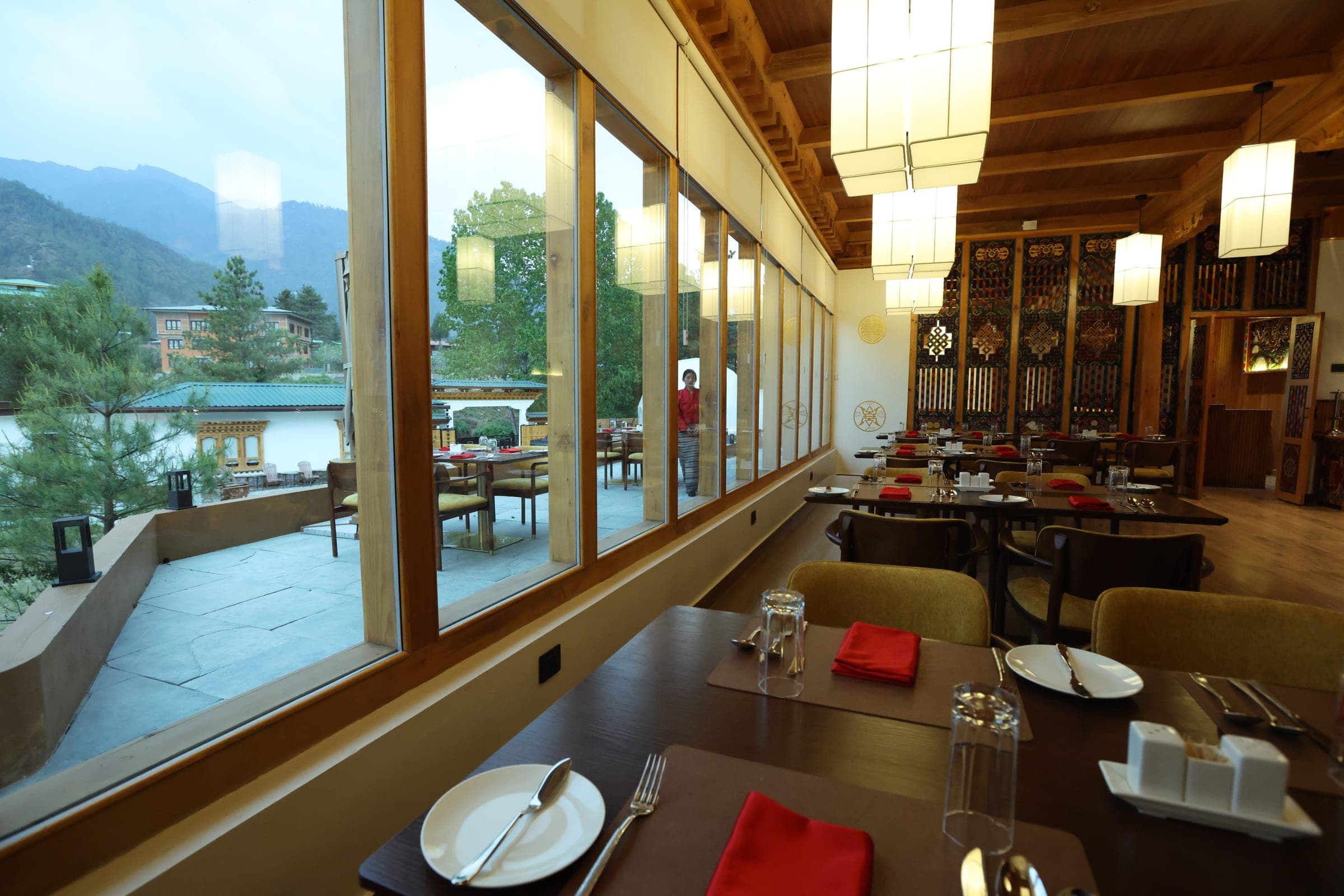 Window-side restaurant table overlooking the Paro valley