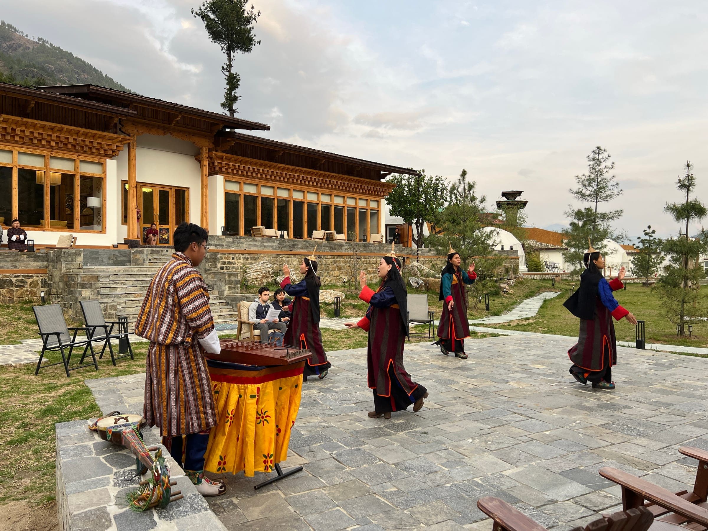 Traditional Bhutanese cultural dance performance at Highland Glamping Paro