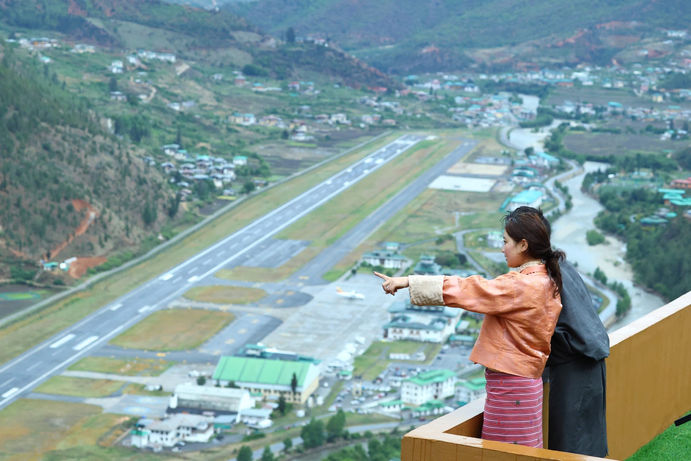 Hilltop viewpoint over the Paro airport runway and the valley below